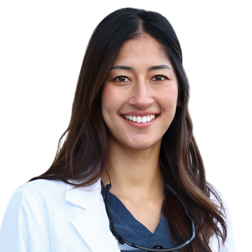 Smiling female doctor in a white coat with a stethoscope around her neck.